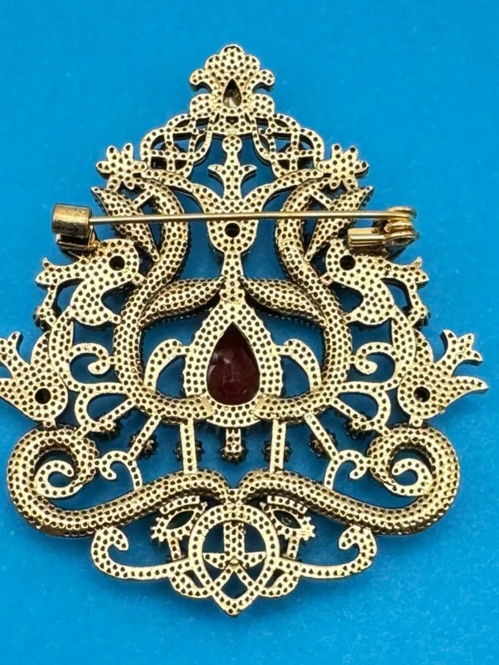 Ornate Shield Brooch Pin Red Green Clear Rhinestones Gold Tone Filigree